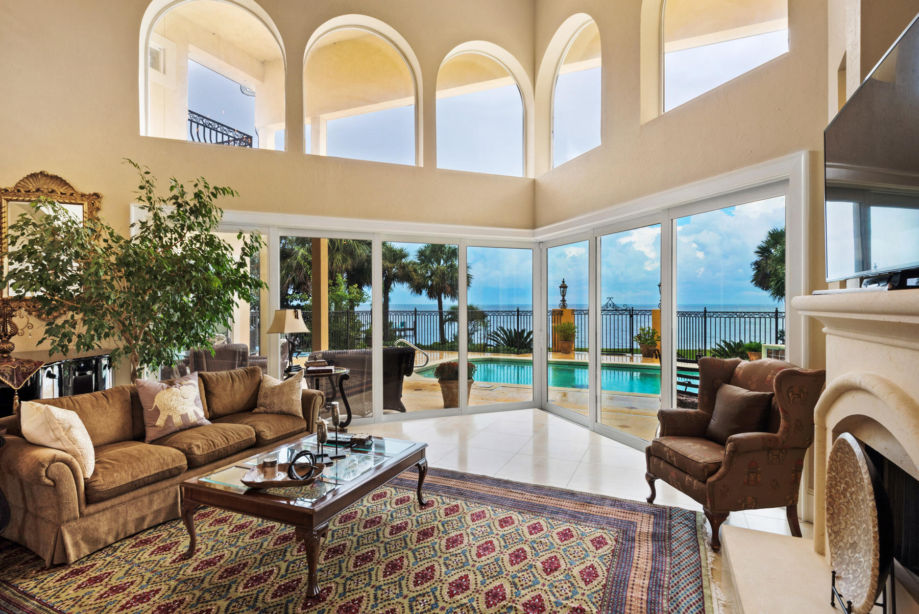 1239 Driftwood Point Road Santa Rosa Beach, FL 32459 - Photo 9 of 66 a living room with fireplace furniture and a large window