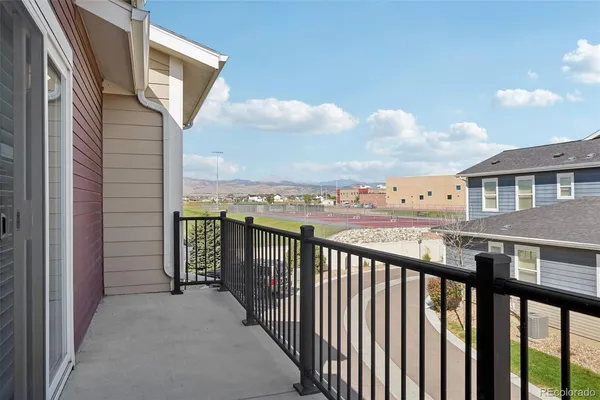 a view of a balcony with city view