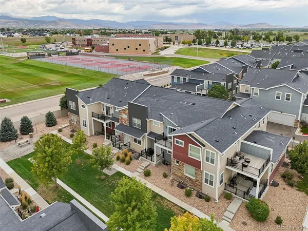 an aerial view of a house with a garden