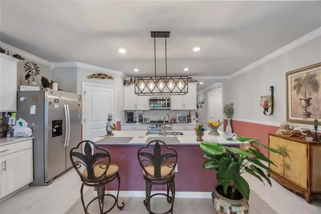 a bed room with furniture a baby crib and a window