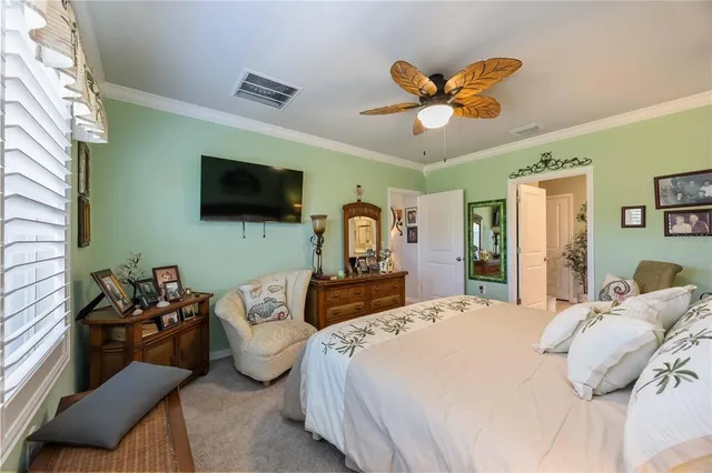 a view of a garden with a table and chairs