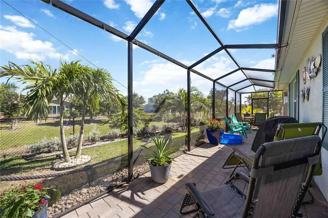 an aerial view of a house with a garden