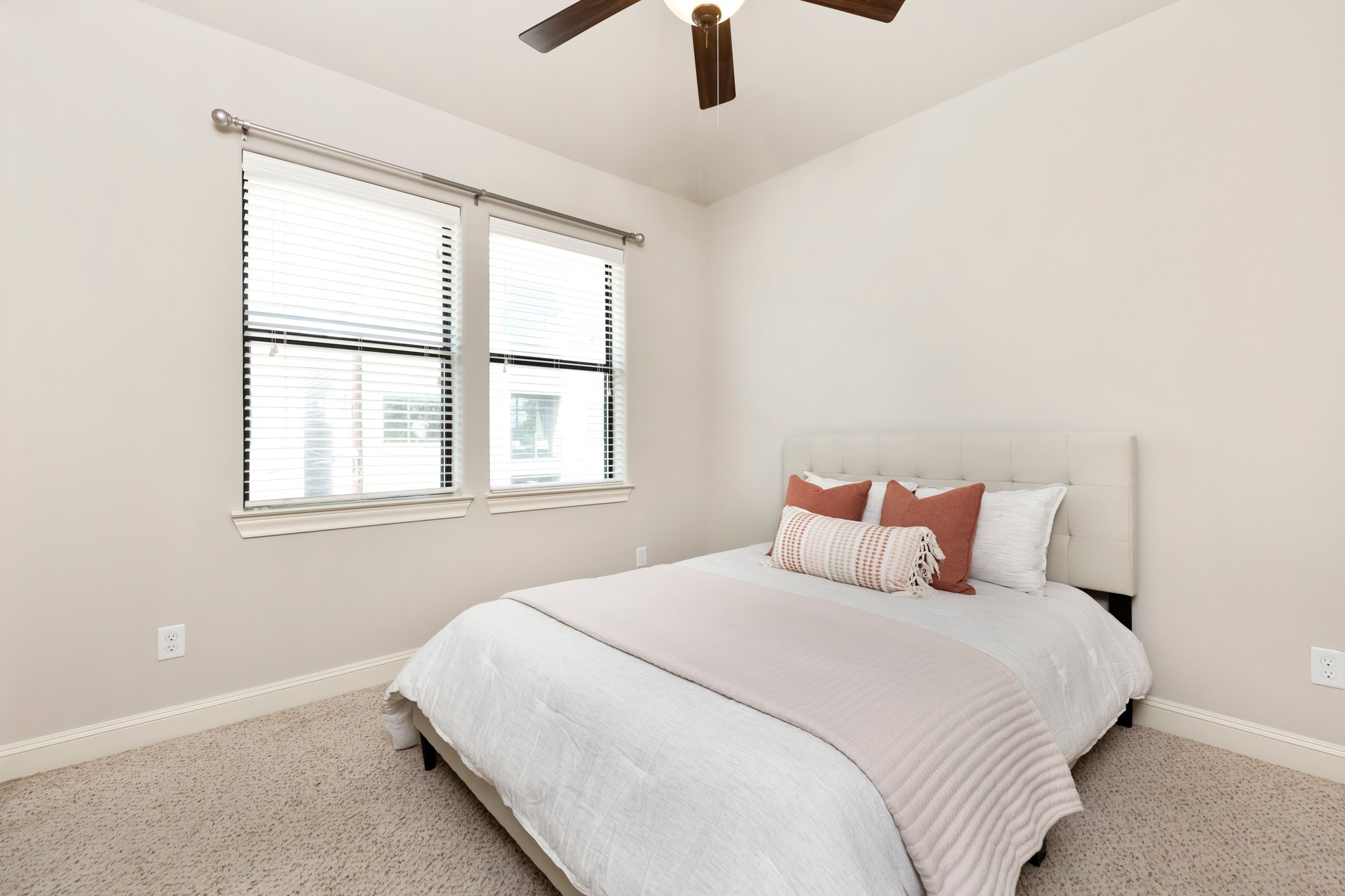 1406 Hickory Street Houston, TX 77007 - Photo 37 of 41 a bedroom with a large bed and a large window