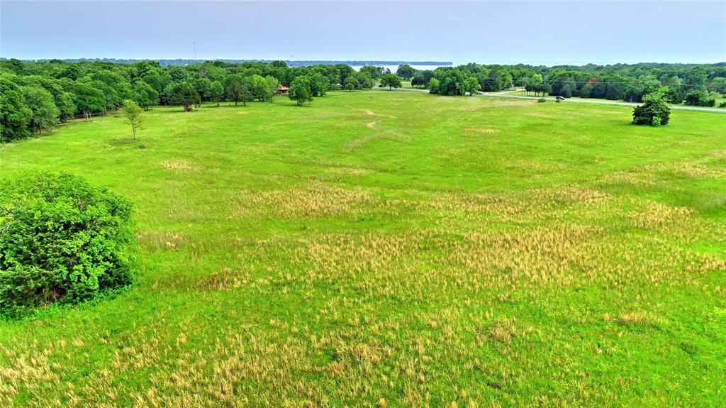 0 Center Drive Point, TX 75472 - Photo 18 of 27 a view of a garden with a building in the background