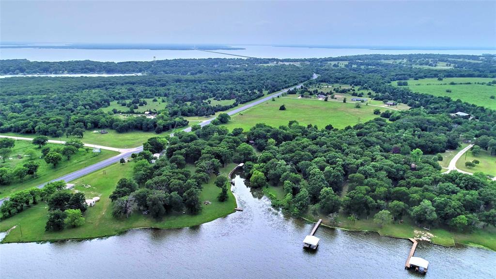 0 Center Drive Point, TX 75472 - Photo 19 of 27 an aerial view of a houses with a yard and lake view