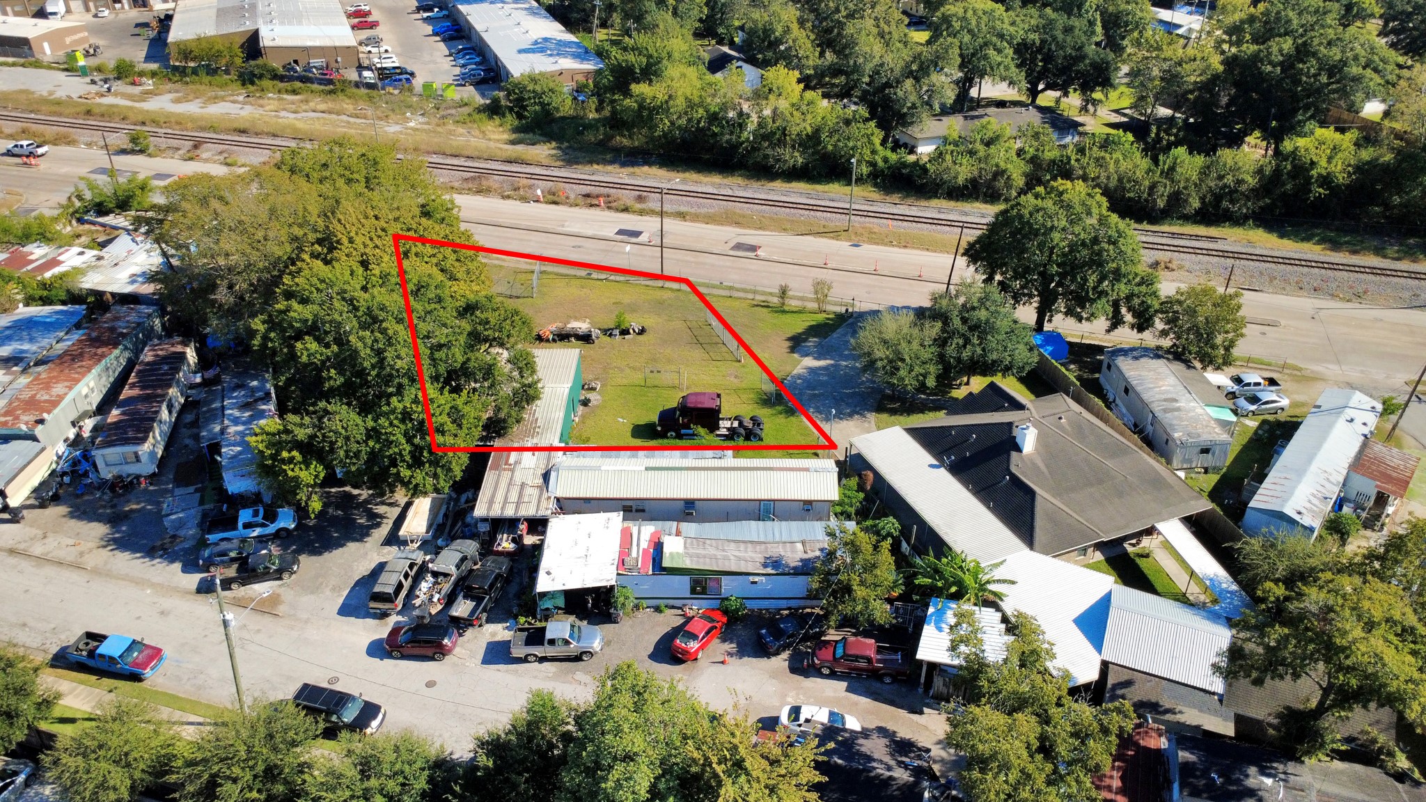 6239 Griggs Road Houston, TX 77023 - Photo 21 of 22 an aerial view of a house with a yard and potted plants