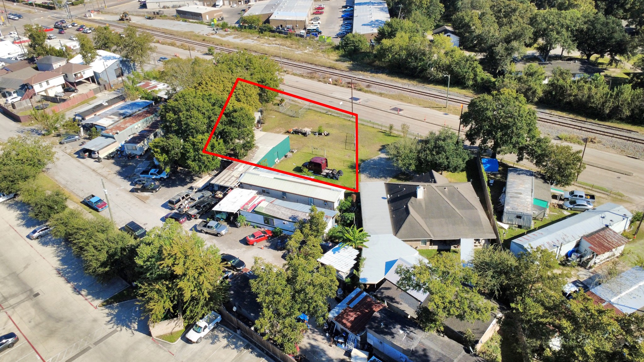 6239 Griggs Road Houston, TX 77023 - Photo 22 of 22 an aerial view of a house with a yard and garden