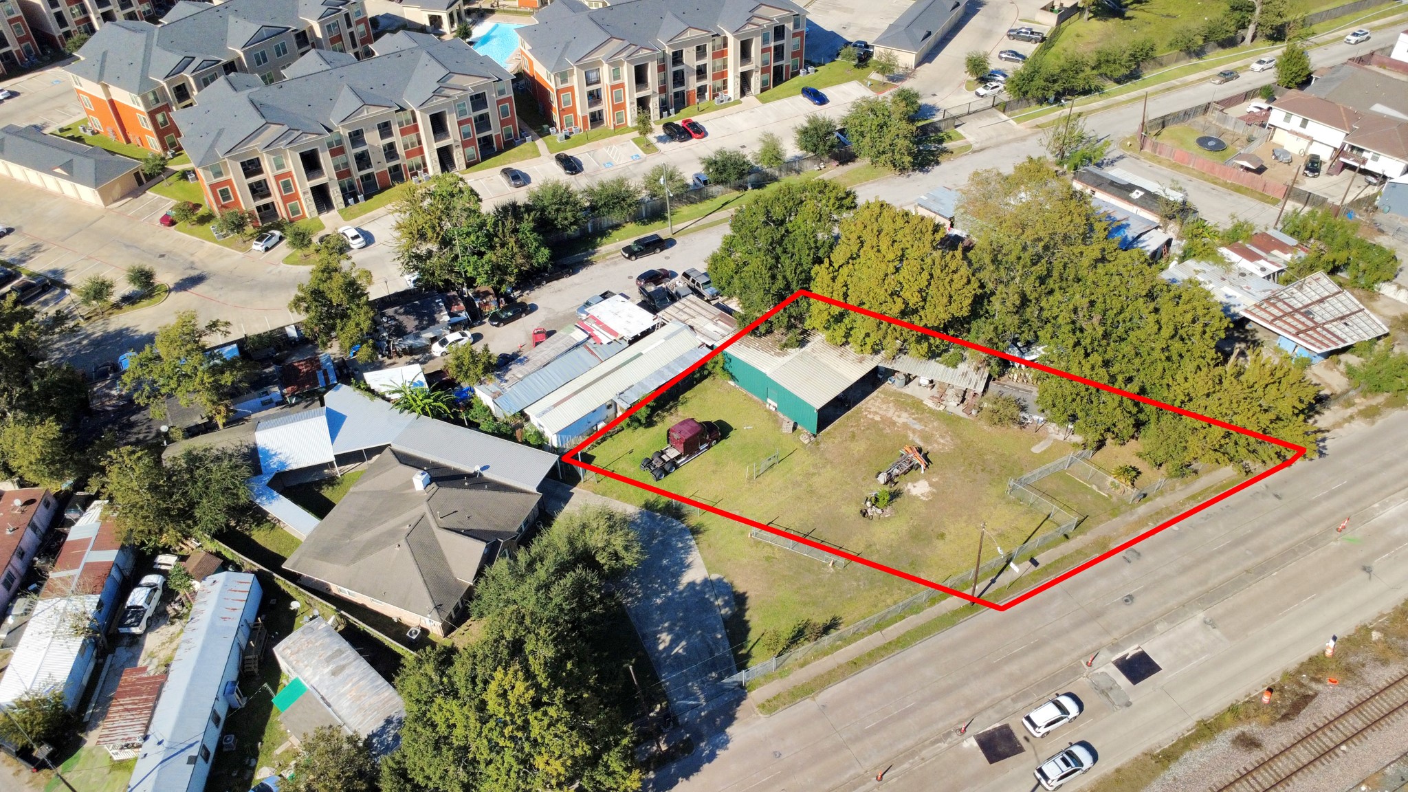 6239 Griggs Road Houston, TX 77023 - Photo 3 of 22 an aerial view of residential houses with outdoor space