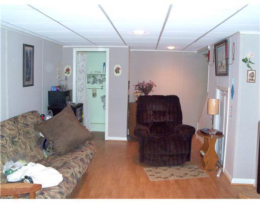 1041 Brewer Lake Road Orrington, ME 04474 - Photo 9 of 16 Den/Family/Great Room. Den/Family Room