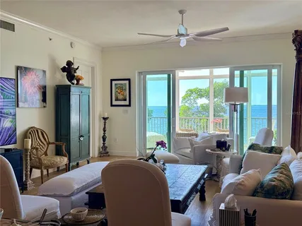 a kitchen with stainless steel appliances granite countertop a stove top oven a sink a counter space and cabinets