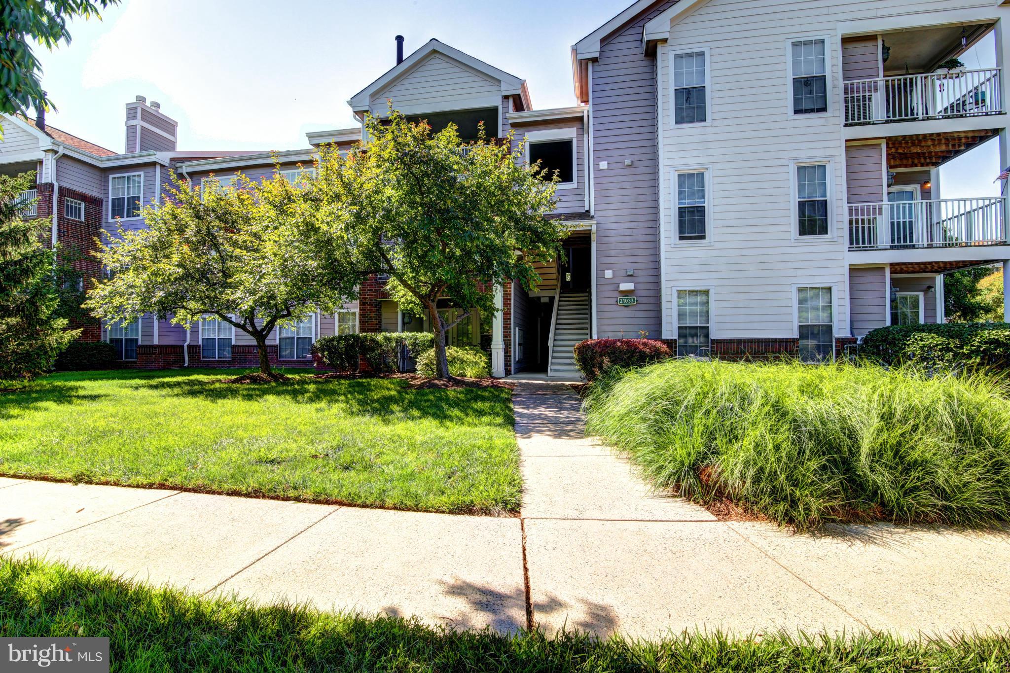 21033 Timber Ridge Terrace, Unit 202 Ashburn, VA 20147 - Photo 1 of 20 Exterior (Front)