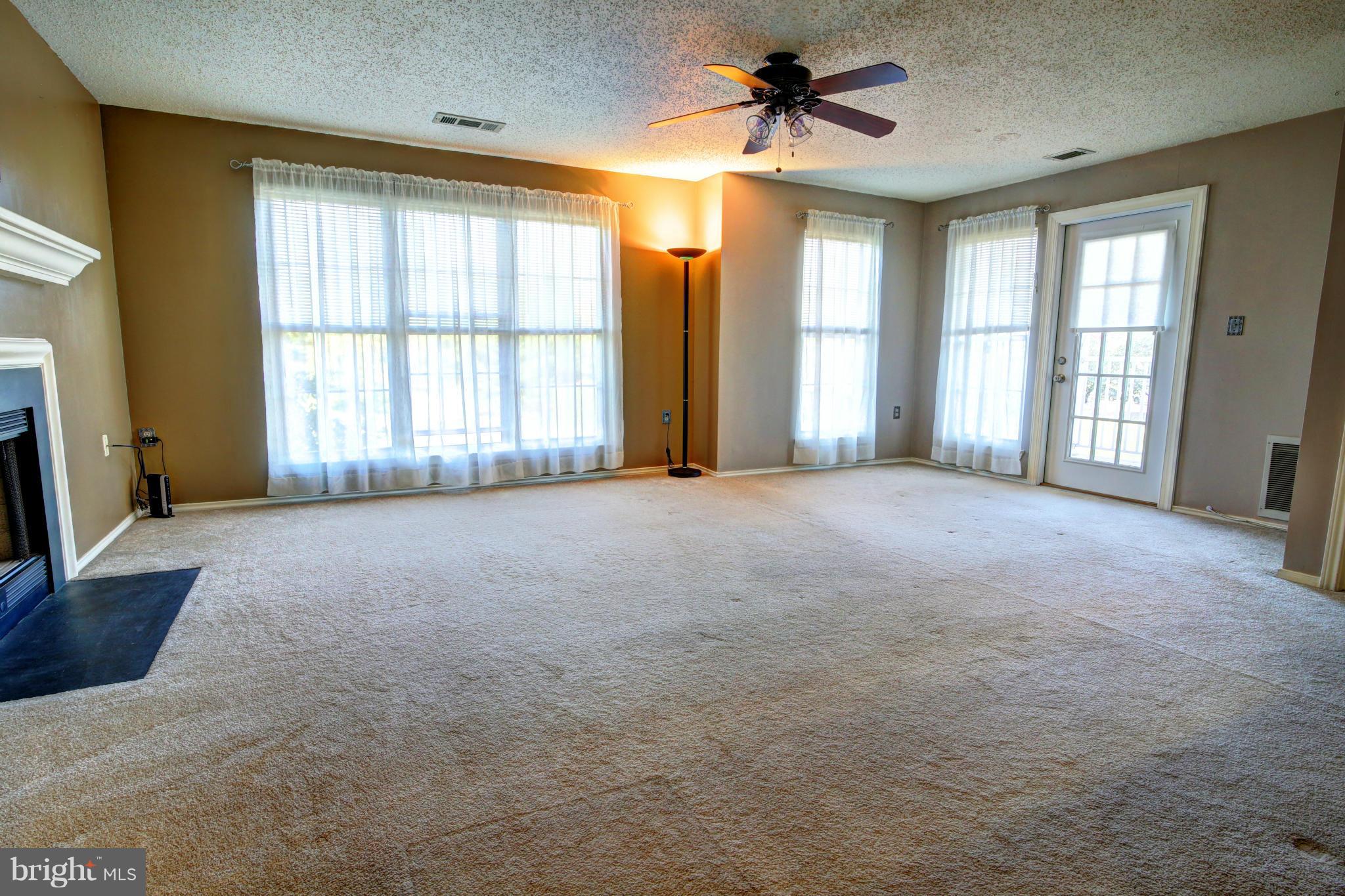 21033 Timber Ridge Terrace, Unit 202 Ashburn, VA 20147 - Photo 9 of 20 Living Room
