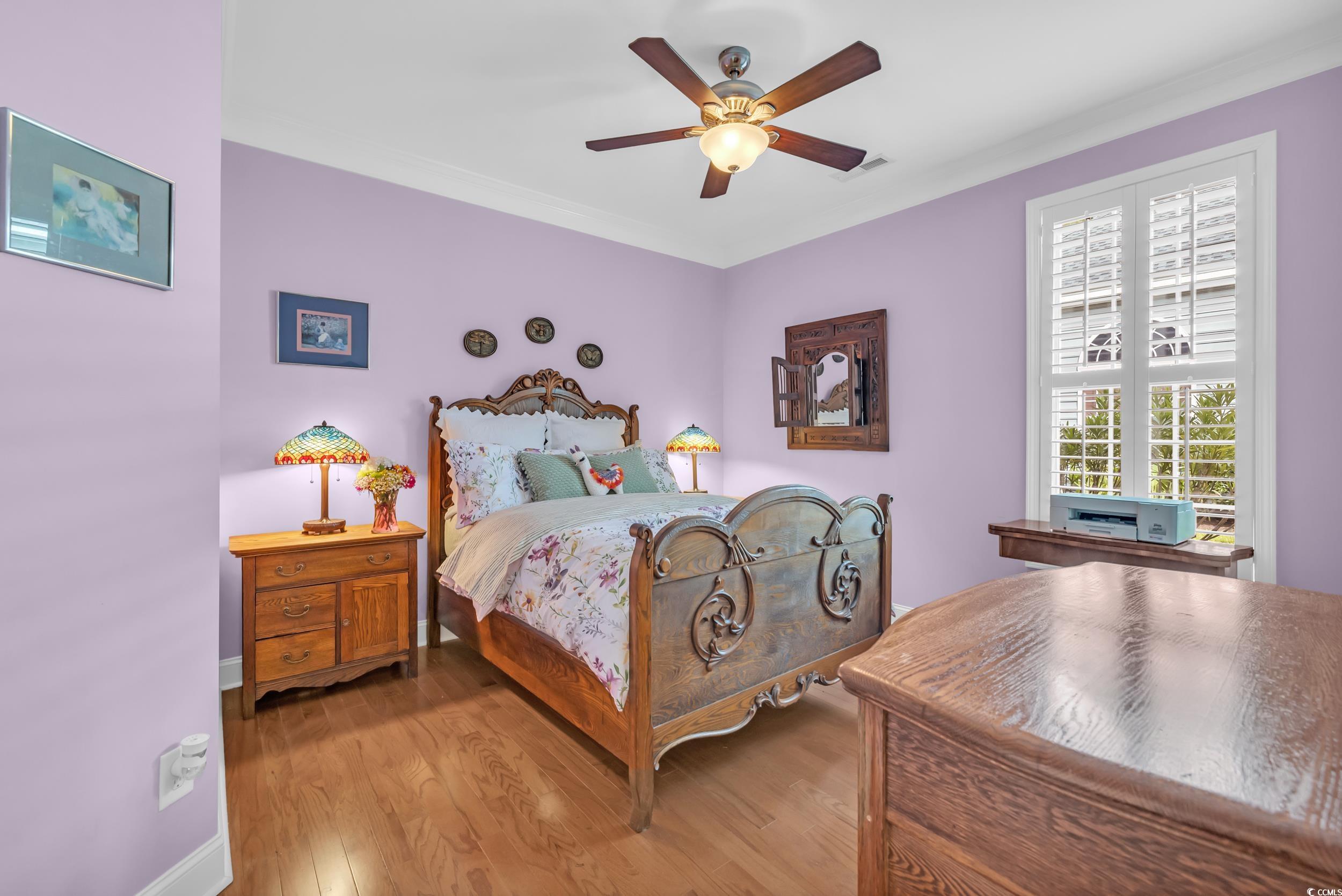3112 Bayhaven Drive Myrtle Beach, SC 29579 - Photo 31 of 40 Bedroom with wood finished floors and a ceiling fan
