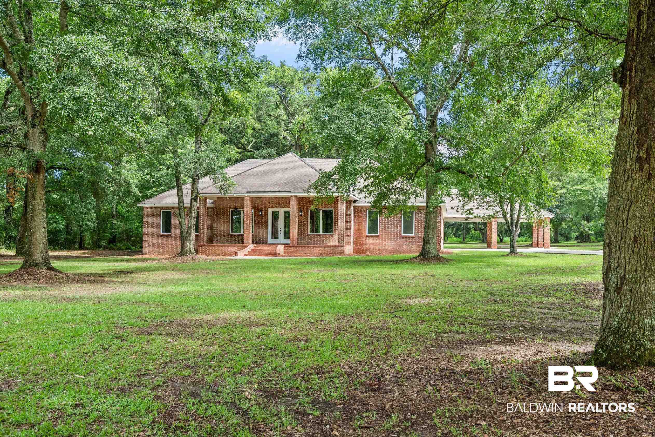 15031 Timber Ridge Drive Loxley, AL 36551 - Photo 4 of 43 Single story home with a front lawn