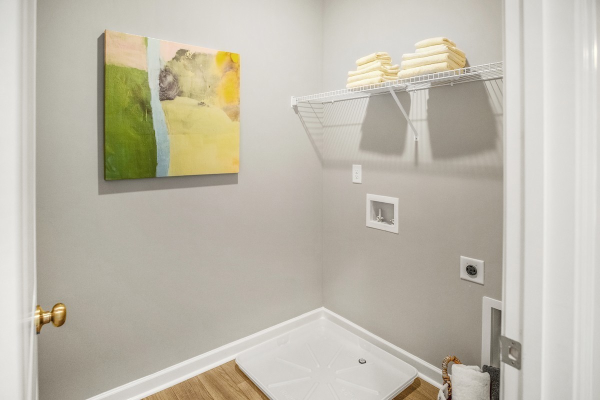 128 Ironhorse Way Dickson, TN 37055 - Photo 12 of 37 a bathroom with a window and a shower