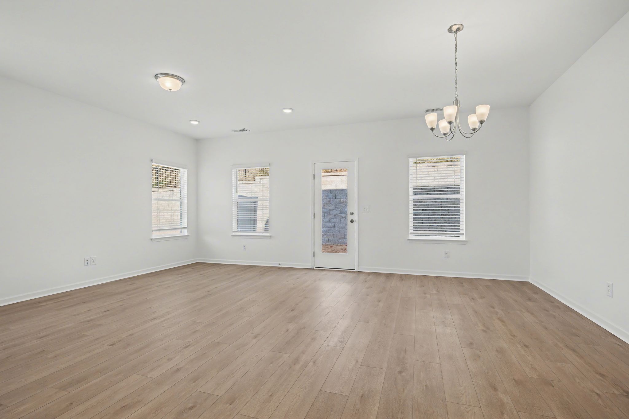 128 Ironhorse Way Dickson, TN 37055 - Photo 20 of 37 a view of livingroom with window hardwood floor and ceiling fan
