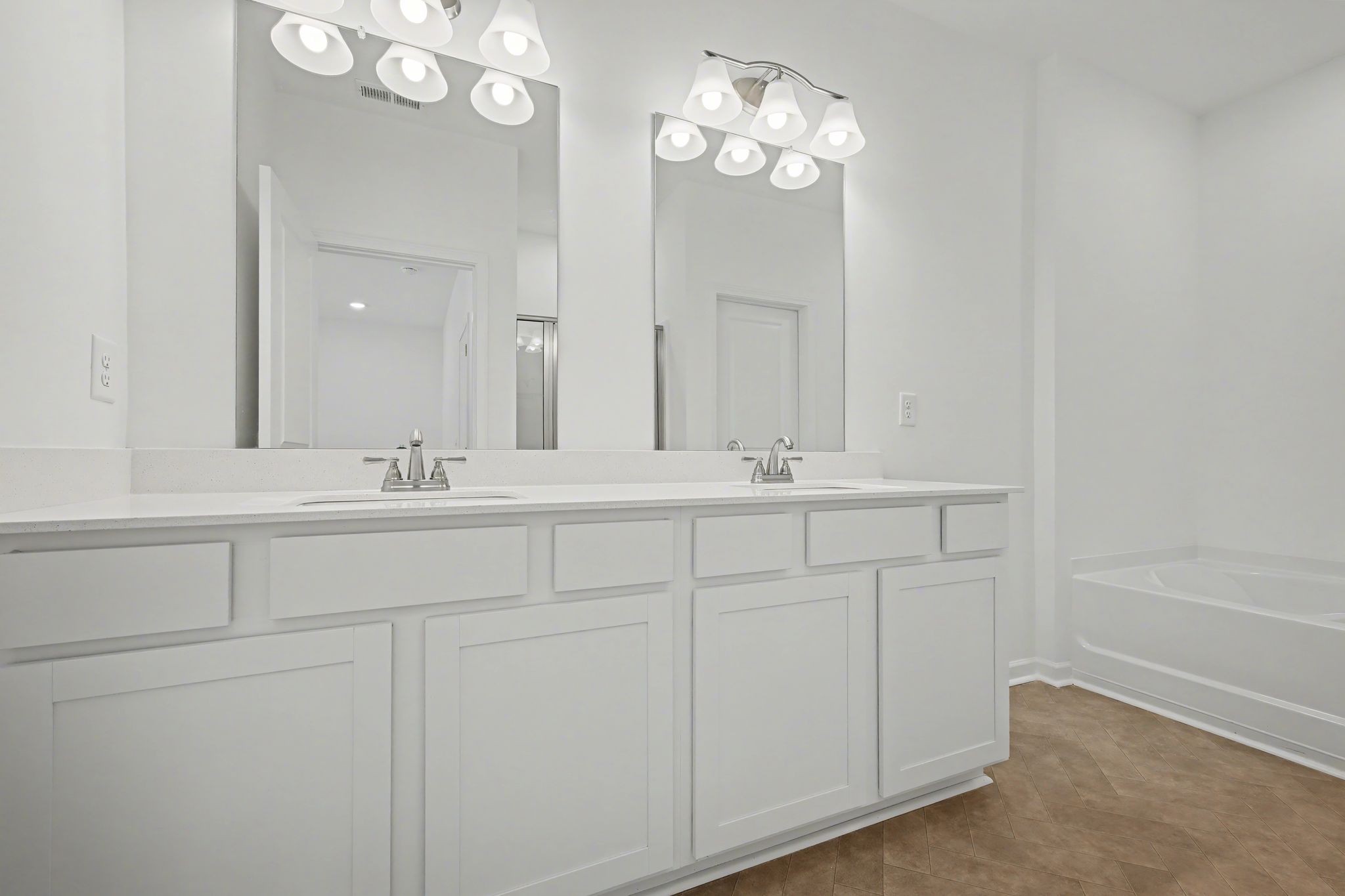 128 Ironhorse Way Dickson, TN 37055 - Photo 29 of 37 a bathroom with a sink vanity and a mirror
