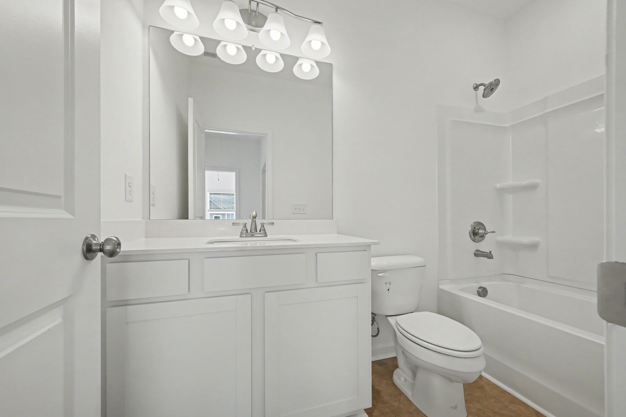 128 Ironhorse Way Dickson, TN 37055 - Photo 35 of 37 a bathroom with a sink a toilet and a mirror