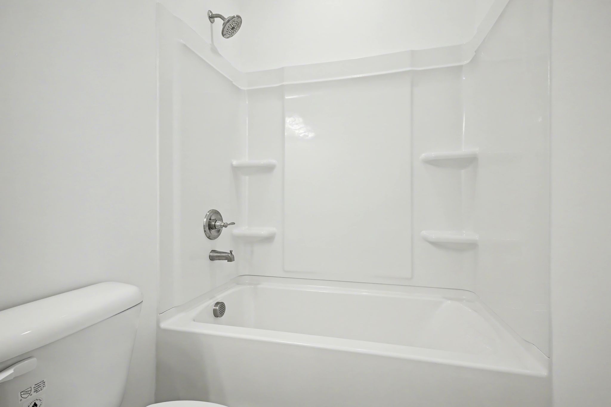 128 Ironhorse Way Dickson, TN 37055 - Photo 36 of 37 a bathroom with a bathtub and toilet