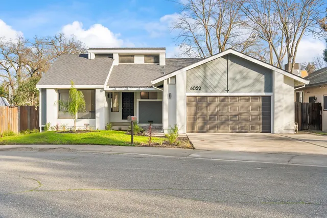 a view of large house with a large windows