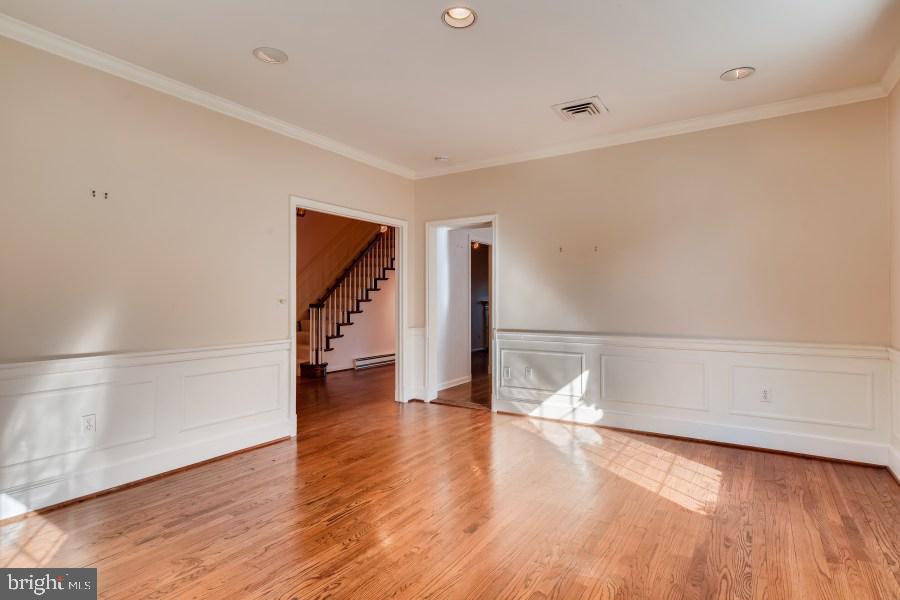 8025 Strauff Road, Unit 7 Baltimore, MD 21204 - Photo 3 of 28 Sunny den with chair rail & crown molding