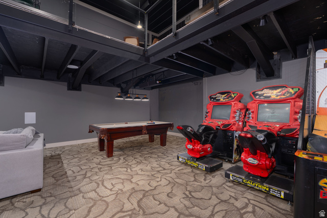 687 South 2080th Street East Springville, UT 84663 - Photo 46 of 149 Recreation area featuring a billiard table with an overhead linear pendant light, patterned carpet flooring, and exposed black ceiling joists