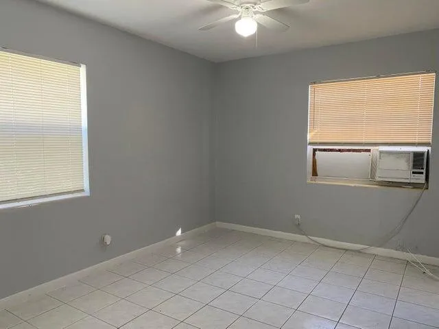 a view of an empty room with window