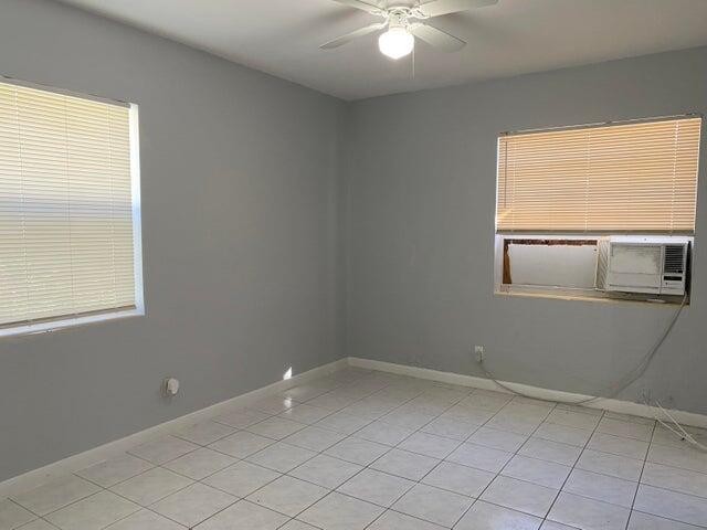 520 52nd Street West Palm Beach, FL 33407 - Photo 1 of 6 a view of an empty room with window