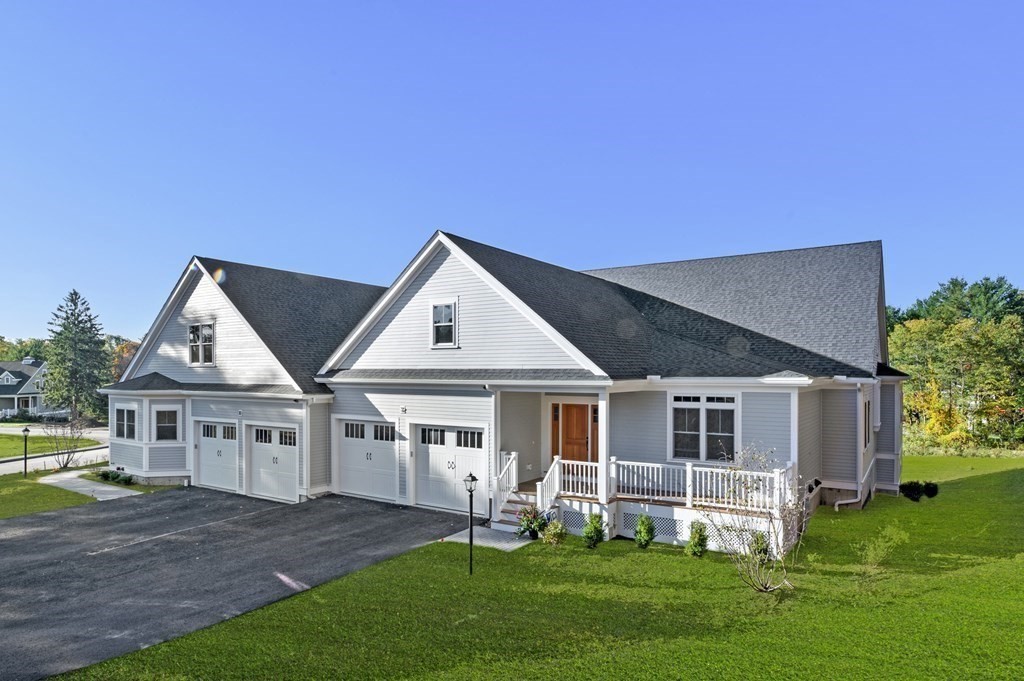 32 Pne Hl Road, Unit 32 Wenham, MA 01984 - Photo 2 of 36 a view of a house with a yard and sitting area