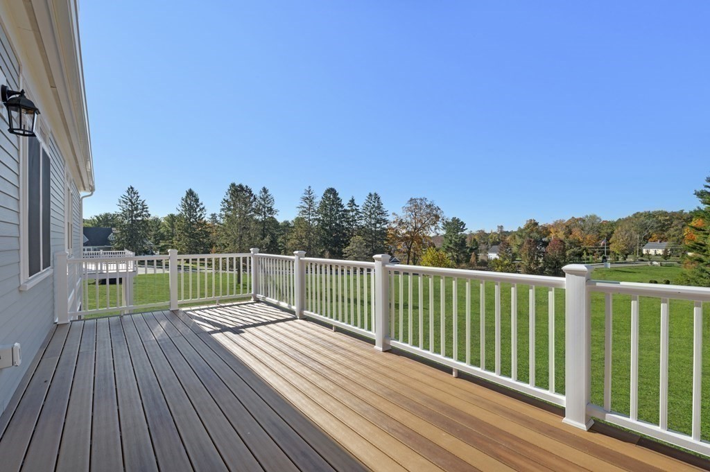 32 Pne Hl Road, Unit 32 Wenham, MA 01984 - Photo 4 of 36 a view of balcony with wooden floor and fence