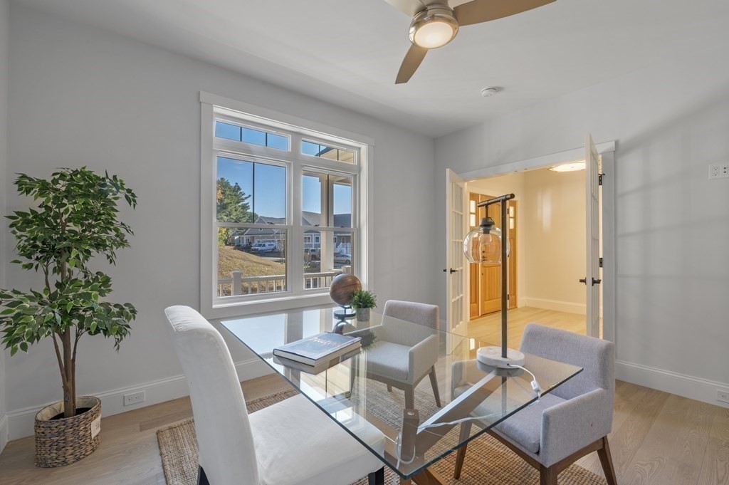 32 Pne Hl Road, Unit 32 Wenham, MA 01984 - Photo 10 of 36 a dining room with furniture and window