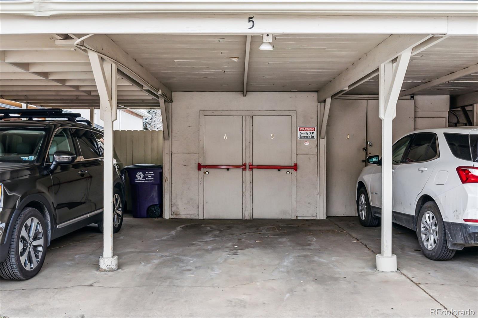 160 Jackson Street, Unit 5 Denver, CO 80206 - Photo 25 of 35 a view of parking garage with cars