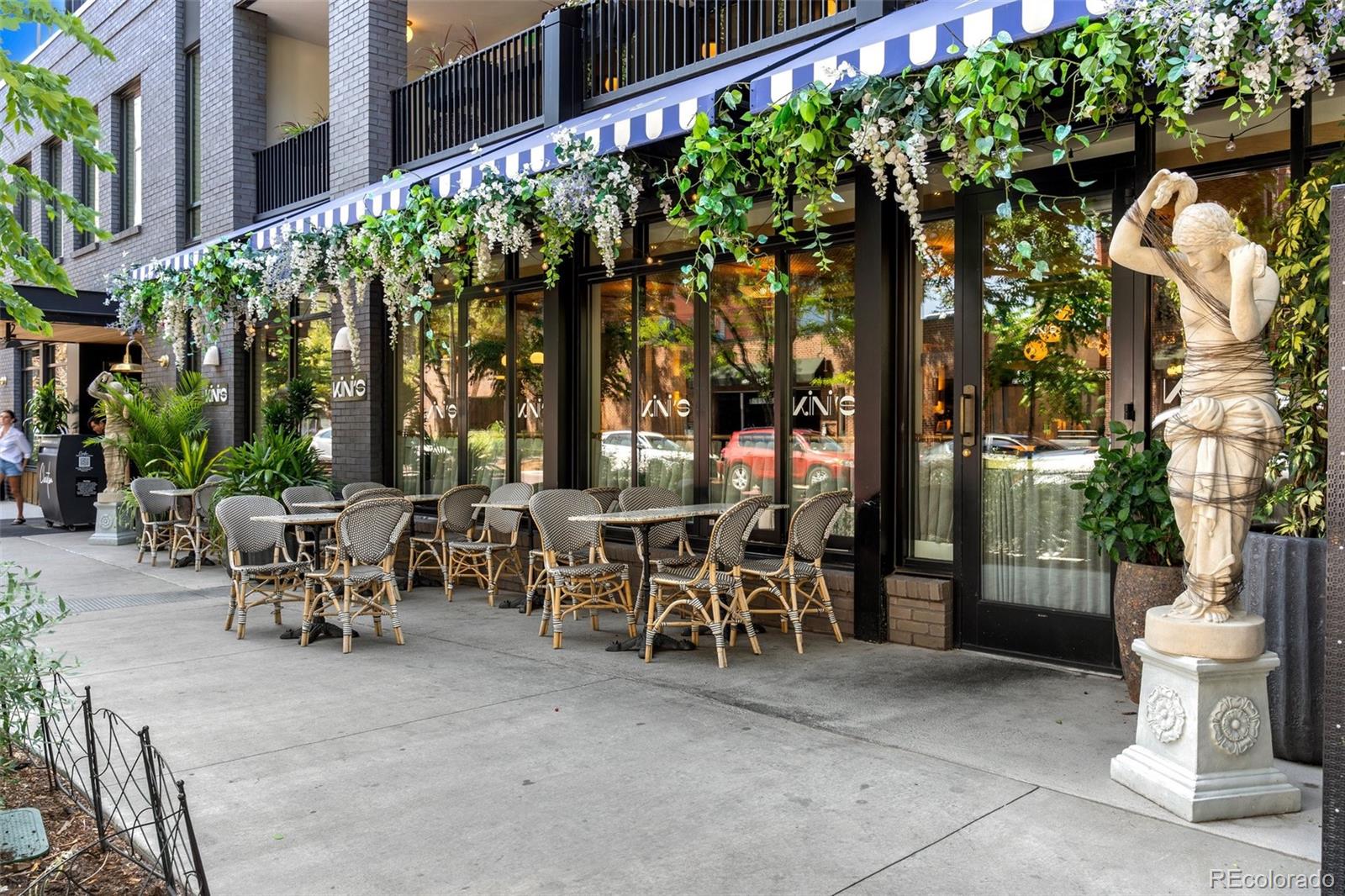 160 Jackson Street, Unit 5 Denver, CO 80206 - Photo 28 of 35 a view of a patio with table and chairs and potted plants