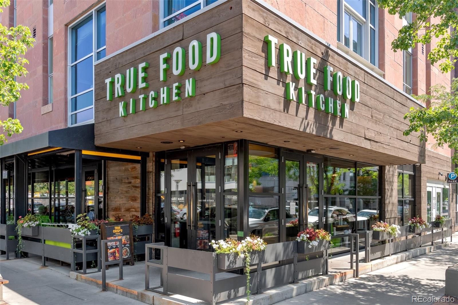 160 Jackson Street, Unit 5 Denver, CO 80206 - Photo 32 of 35 a view of a building with sitting area