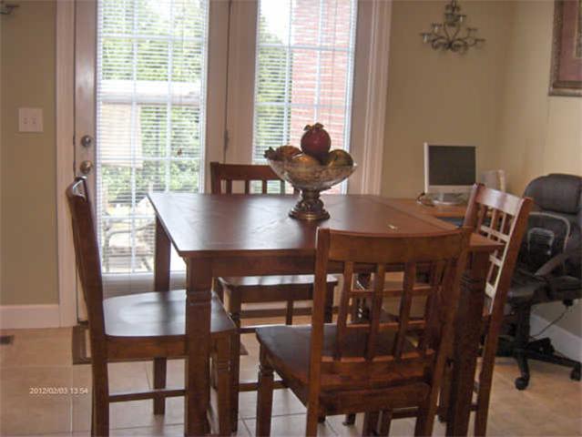 115 Conquest Road Murfreesboro, TN 37128 - Photo 9 of 17 Last view of the kitchen eating area which leads to the patio in the back yard.