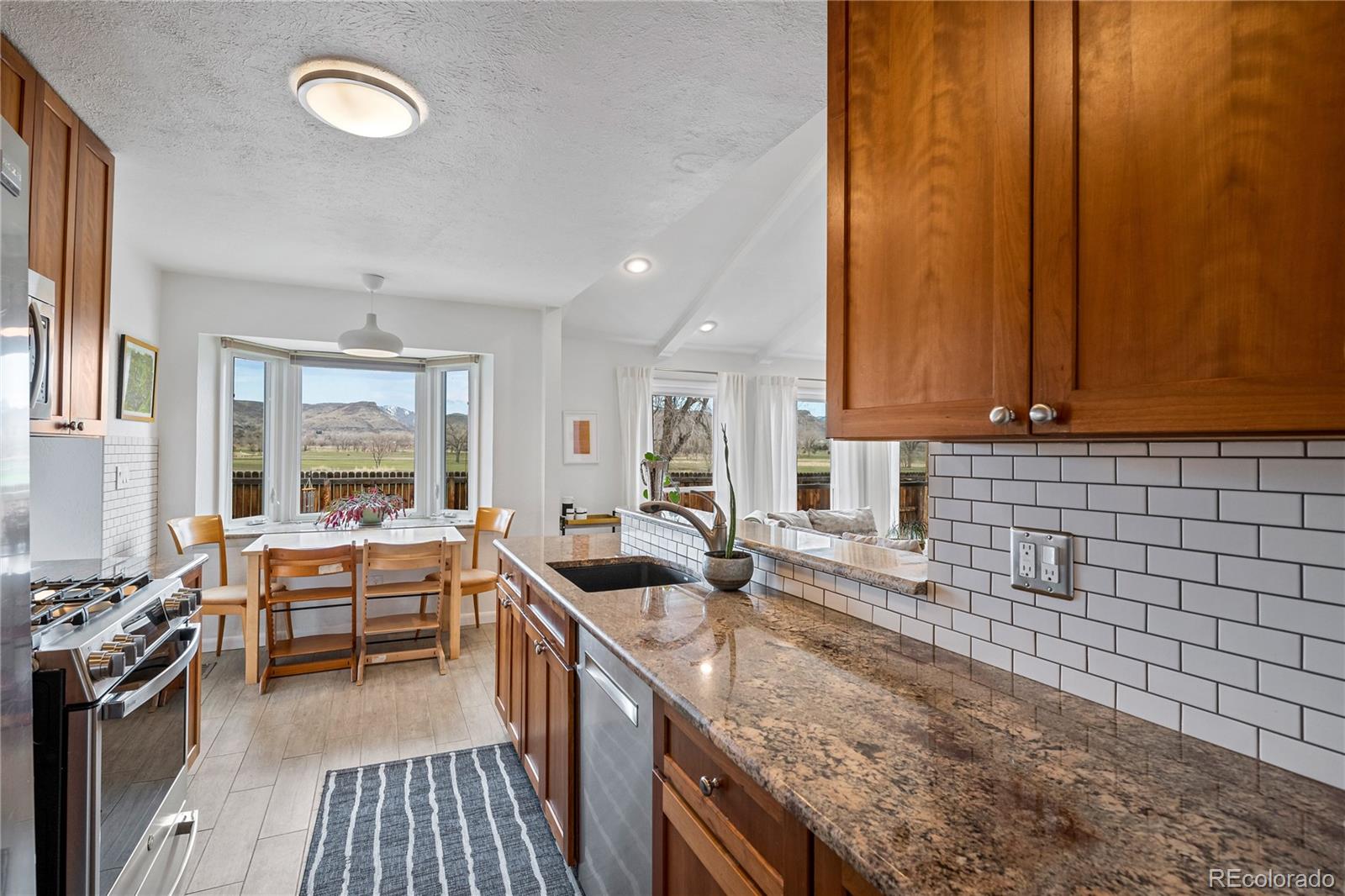 3385 Braun Road Golden, CO 80401 - Photo 14 of 40 a kitchen with counter top space and a sink