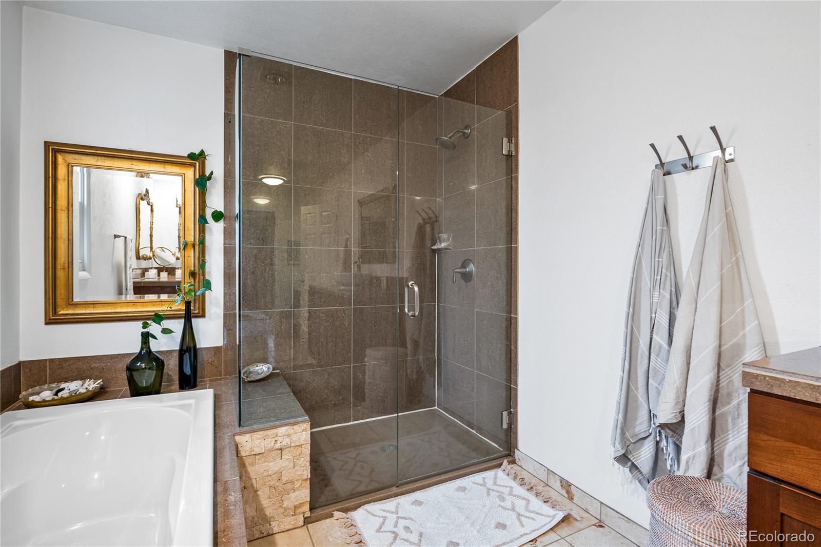 3385 Braun Road Golden, CO 80401 - Photo 20 of 40 a bathroom with a shower and a sink