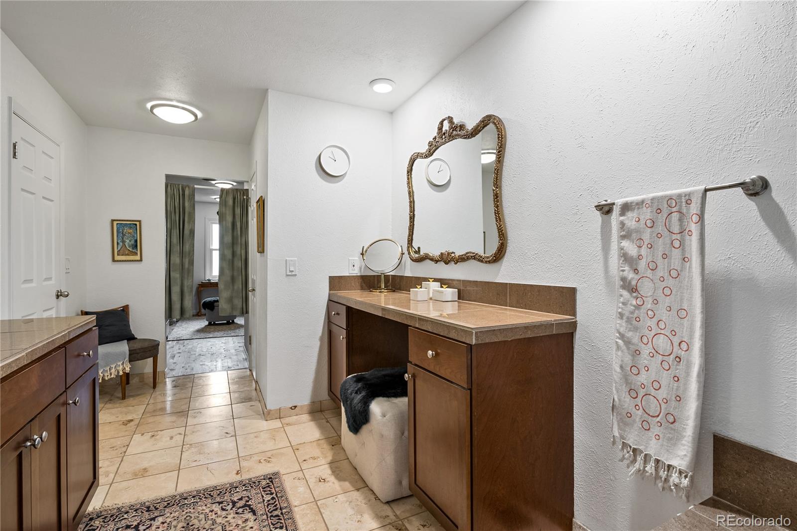 3385 Braun Road Golden, CO 80401 - Photo 21 of 40 a bathroom with a sink and a mirror