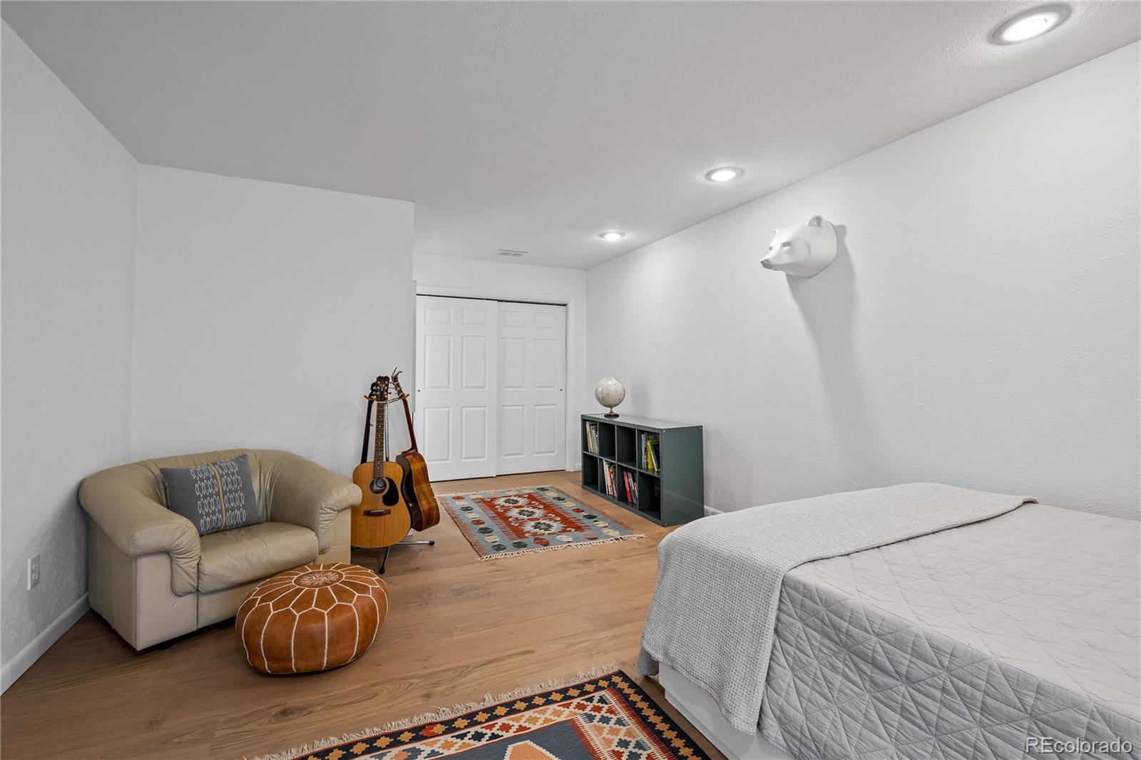 3385 Braun Road Golden, CO 80401 - Photo 26 of 40 a bed room with furniture and a couch