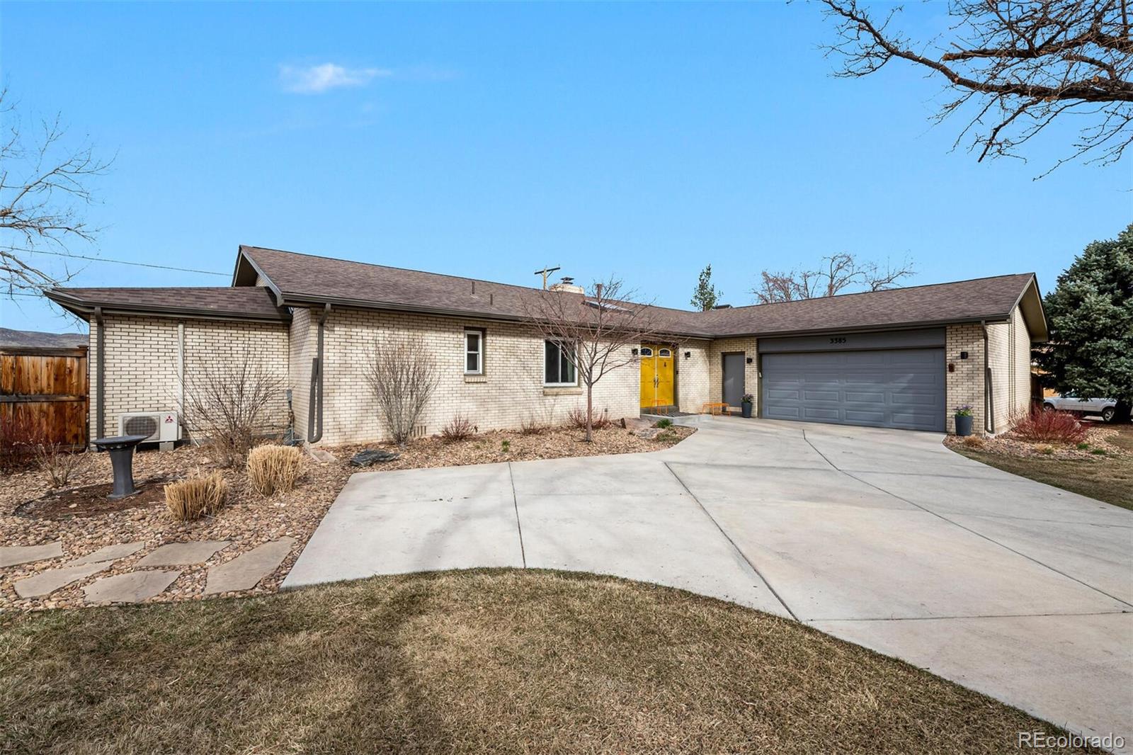 3385 Braun Road Golden, CO 80401 - Photo 3 of 40 a front view of a house with basket ball court and outdoor seating