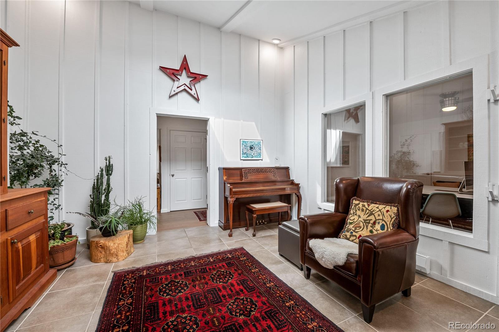 3385 Braun Road Golden, CO 80401 - Photo 5 of 40 a living room with furniture and a fireplace