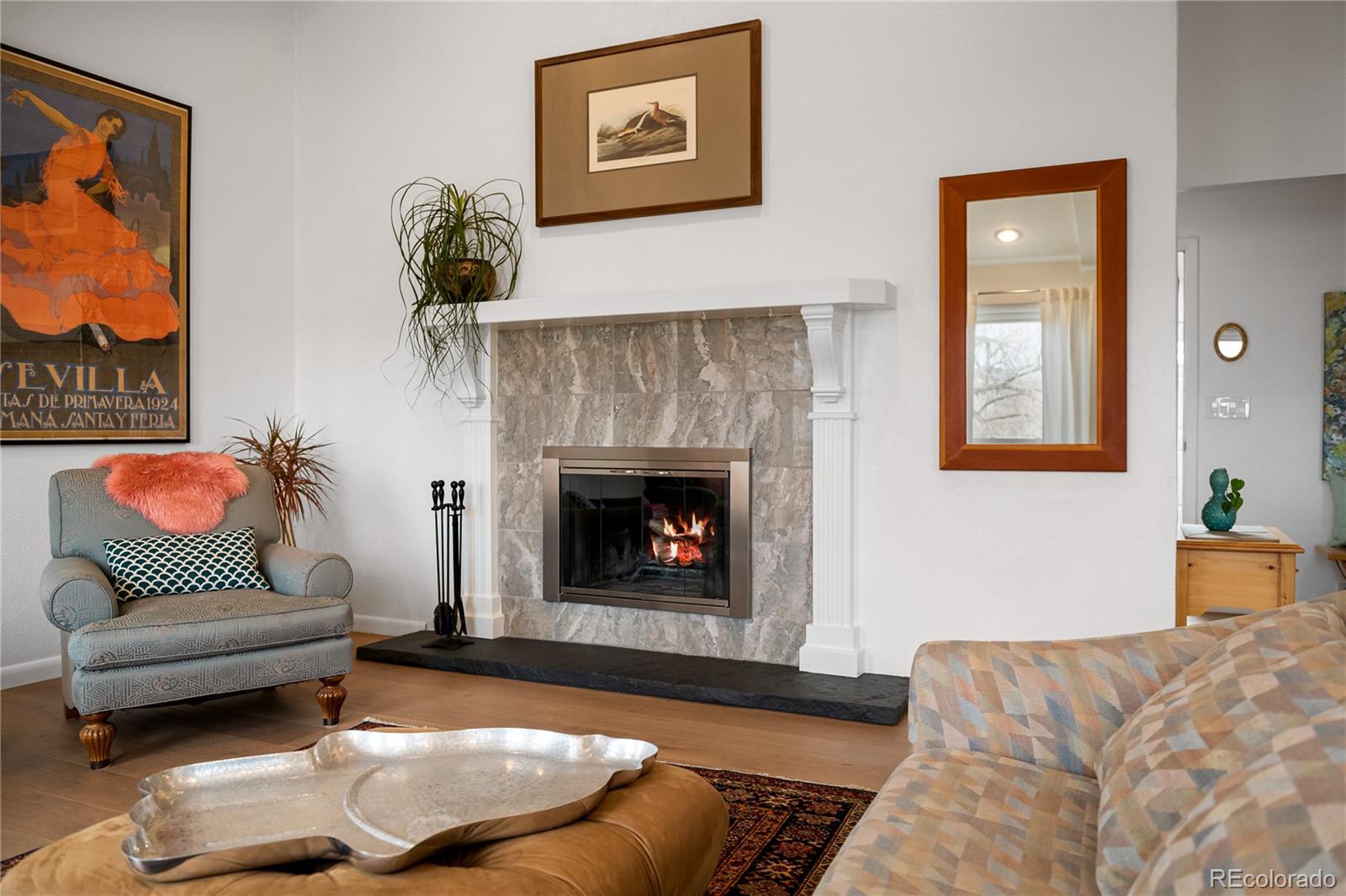 3385 Braun Road Golden, CO 80401 - Photo 9 of 40 a living room with furniture and a fireplace