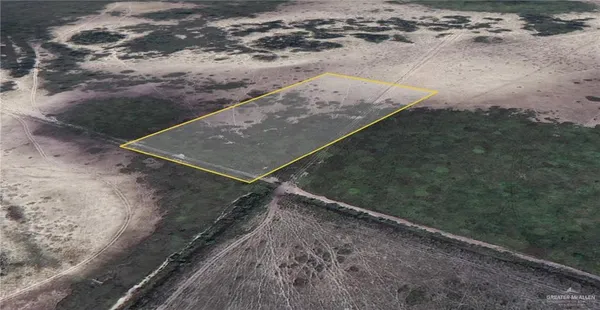 a view of a dry yard with wooden floor