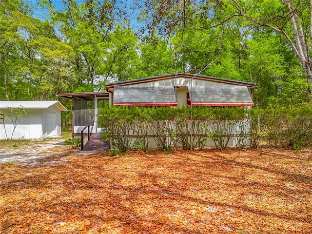a view of a outdoor space and a garage