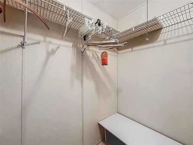 a view of a room with racks on the wall