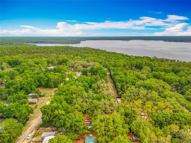 a view of a yard with an ocean