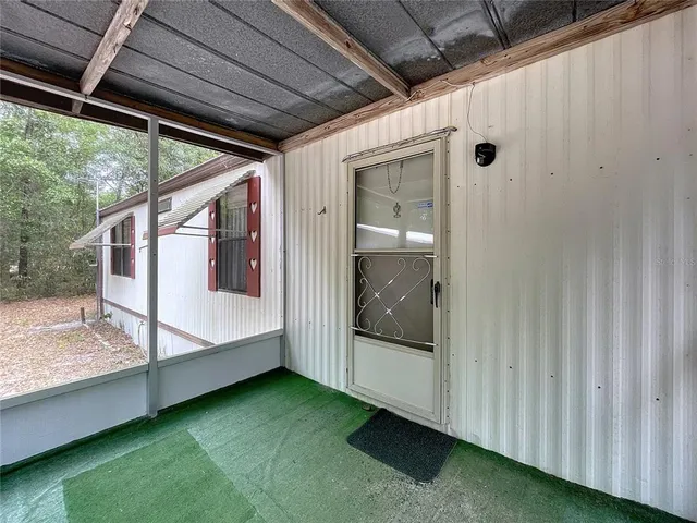 a view of front door and porch