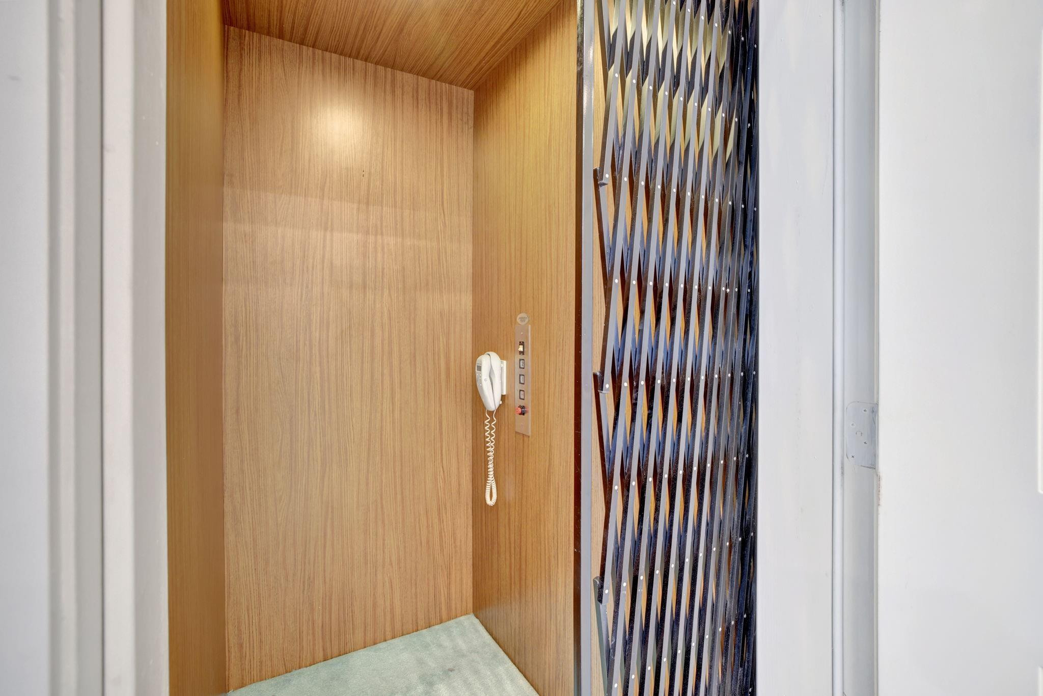 2870 Marina Circle Lighthouse Point, FL 33064 - Photo 22 of 37 Elevator in townhome