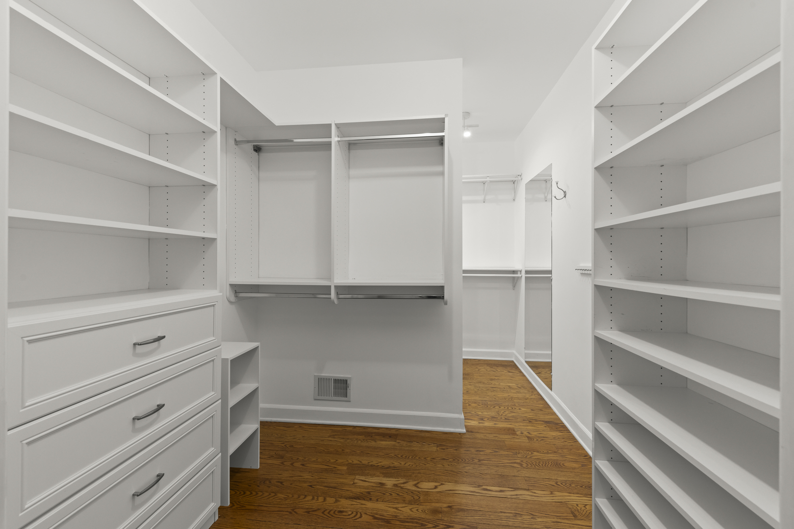 1S151 Winfield Road Wheaton, IL 60189 - Photo 32 of 73 a view of walk in closet with empty racks
