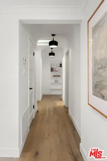 a view of a hallway view with staircase